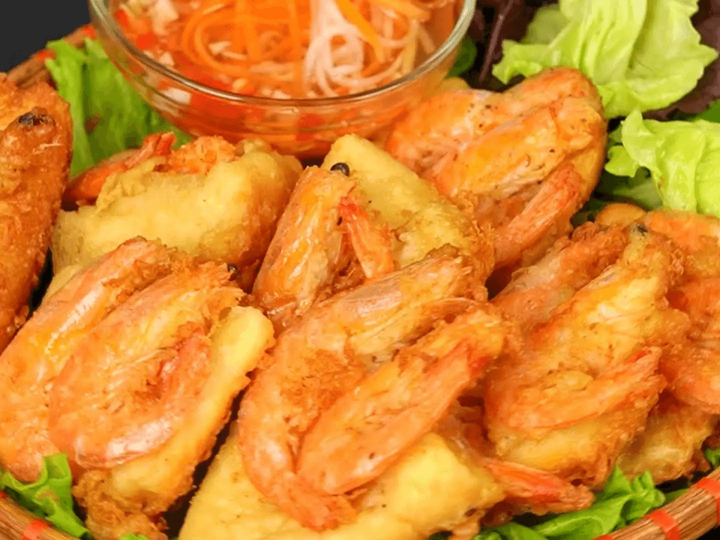 gioi-thieu-ve-mon-banh-mi-chien-tom