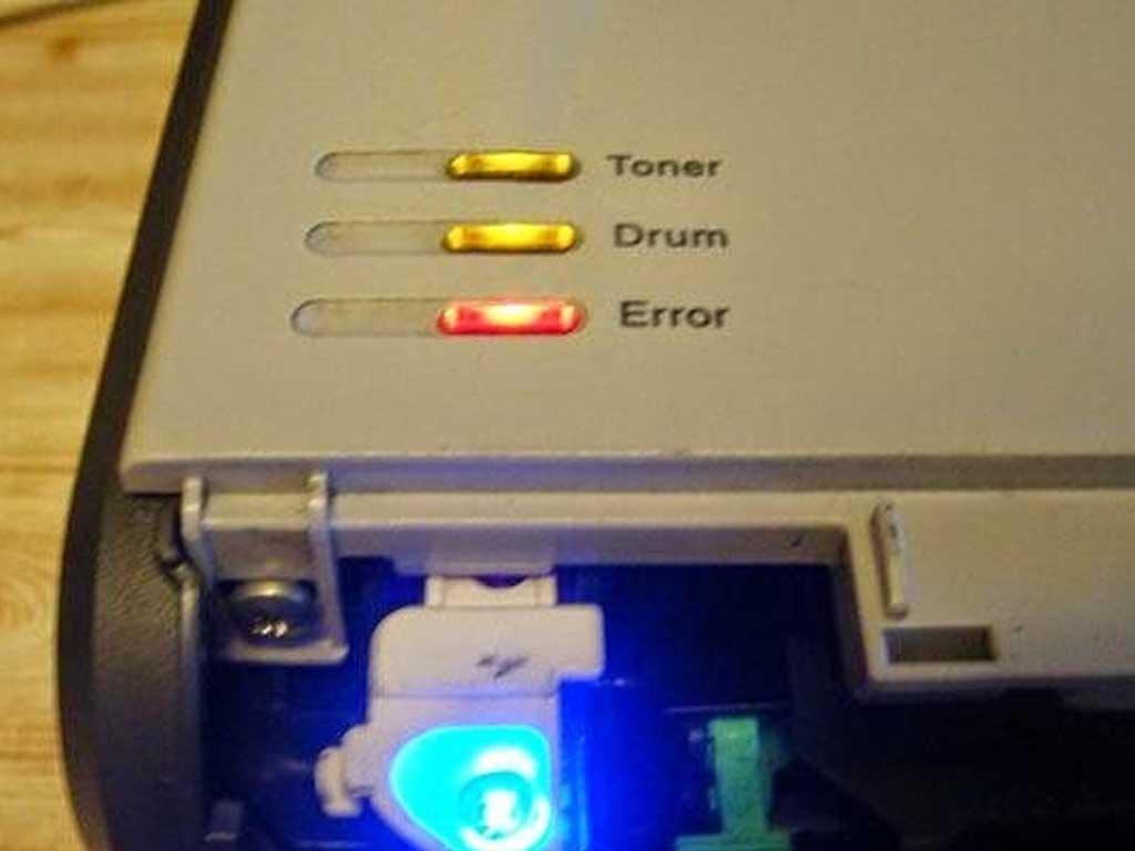 nguyen-nhan-may-in-bao-loi-toner