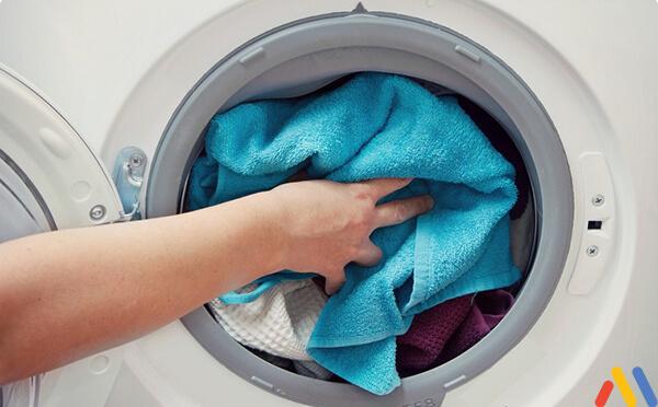 Nên dùng nước giặt hay bột giặt cho máy giặt cửa trước